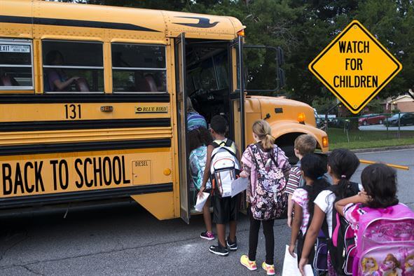 School Students Get on School Bus - Back to School