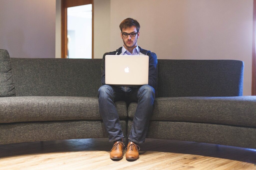 Man Laptop Businessman Preventing Low Back Pain Owning to Long Working Hours.