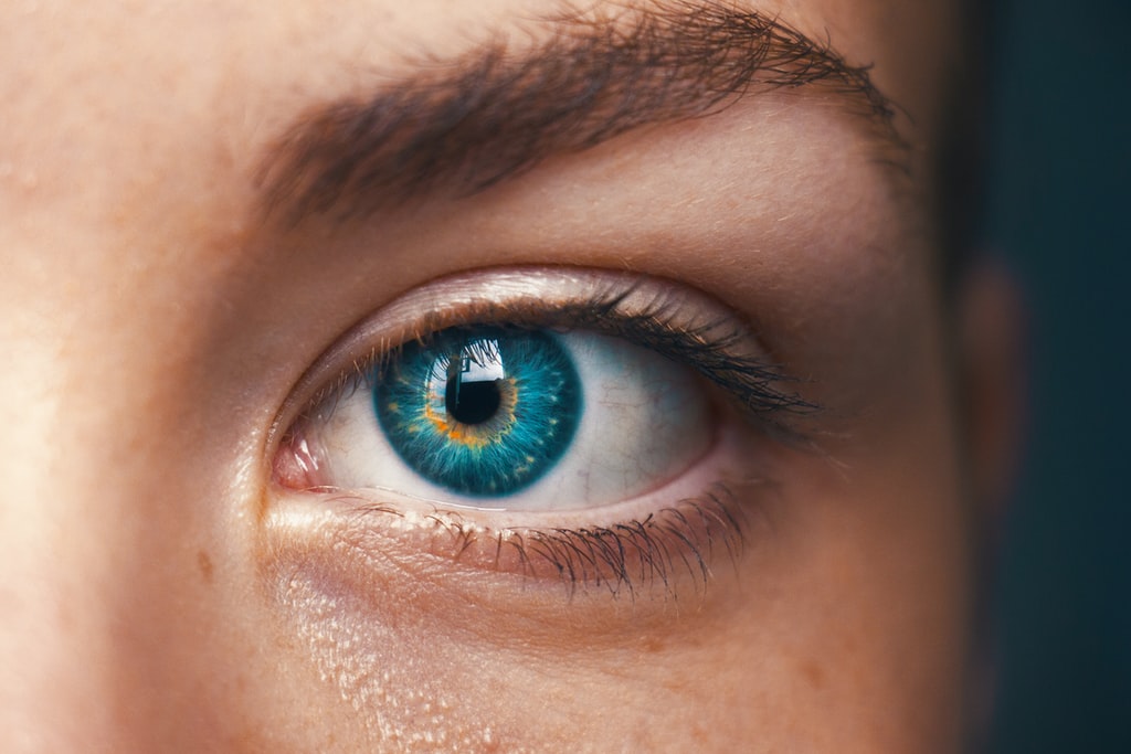 Selective Focus of Blue Eyed Person Photo