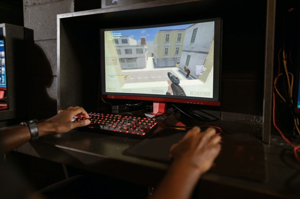 Person Playing Counter Strike Video Game