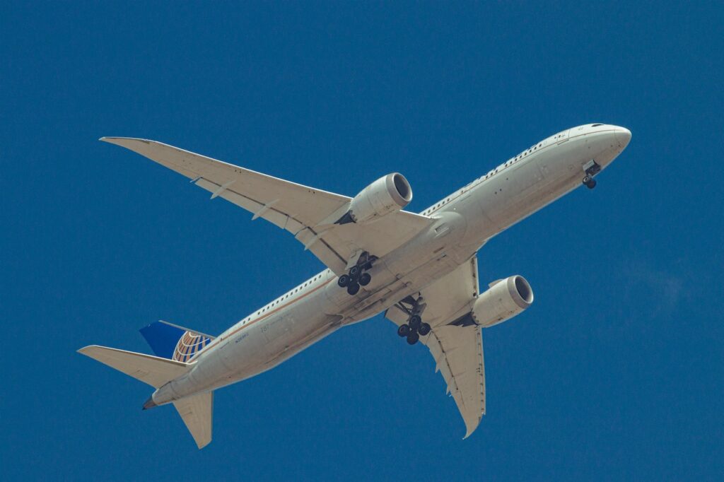 Airplane, Aircraft, Flight flying over blue sky