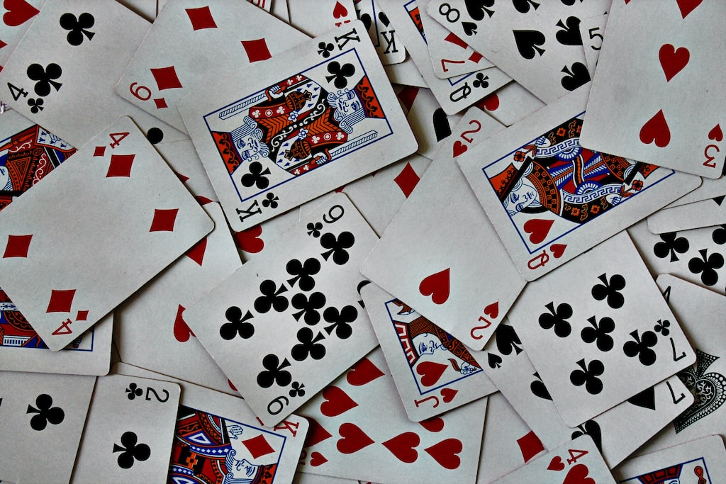 scattered playing cards photo