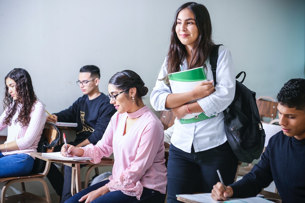 Young Students Sitting in a School Classroom