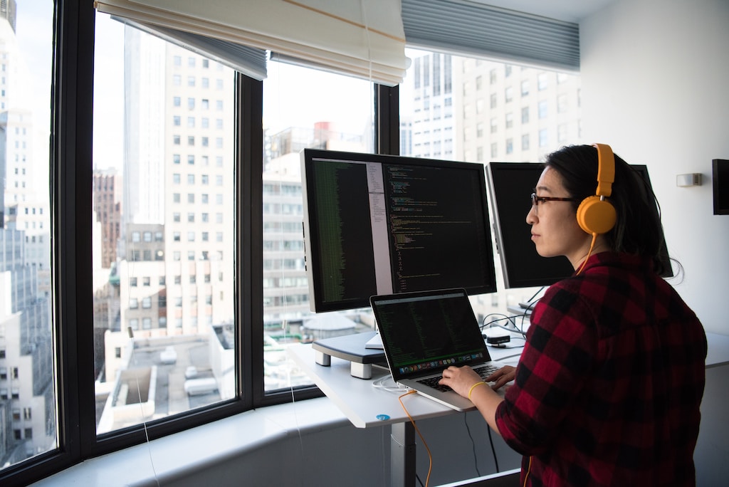 Woman Technologist, Software Developer, Software Engineer Using Macbook Pro