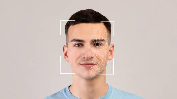 Smiling young caucasian male face scan, Futuristic and technological face scanning for face recognition and person. Personal safety and security.