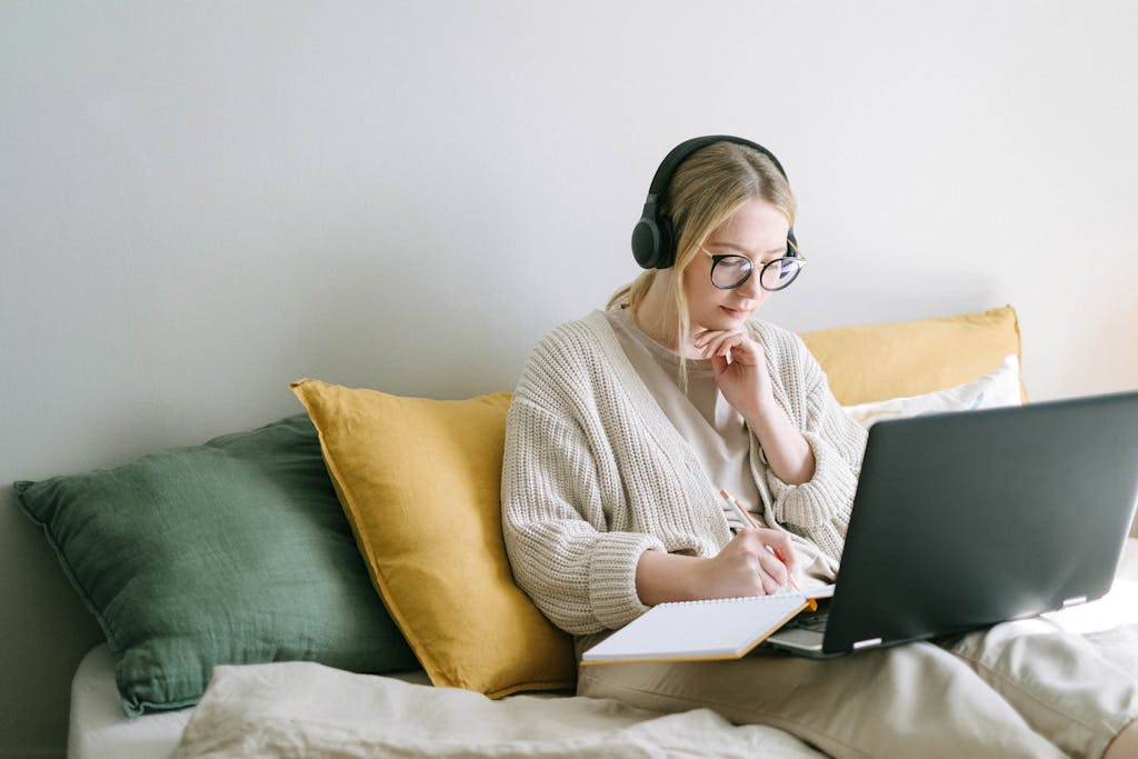 Photo of Woman Taking Notes, Homework